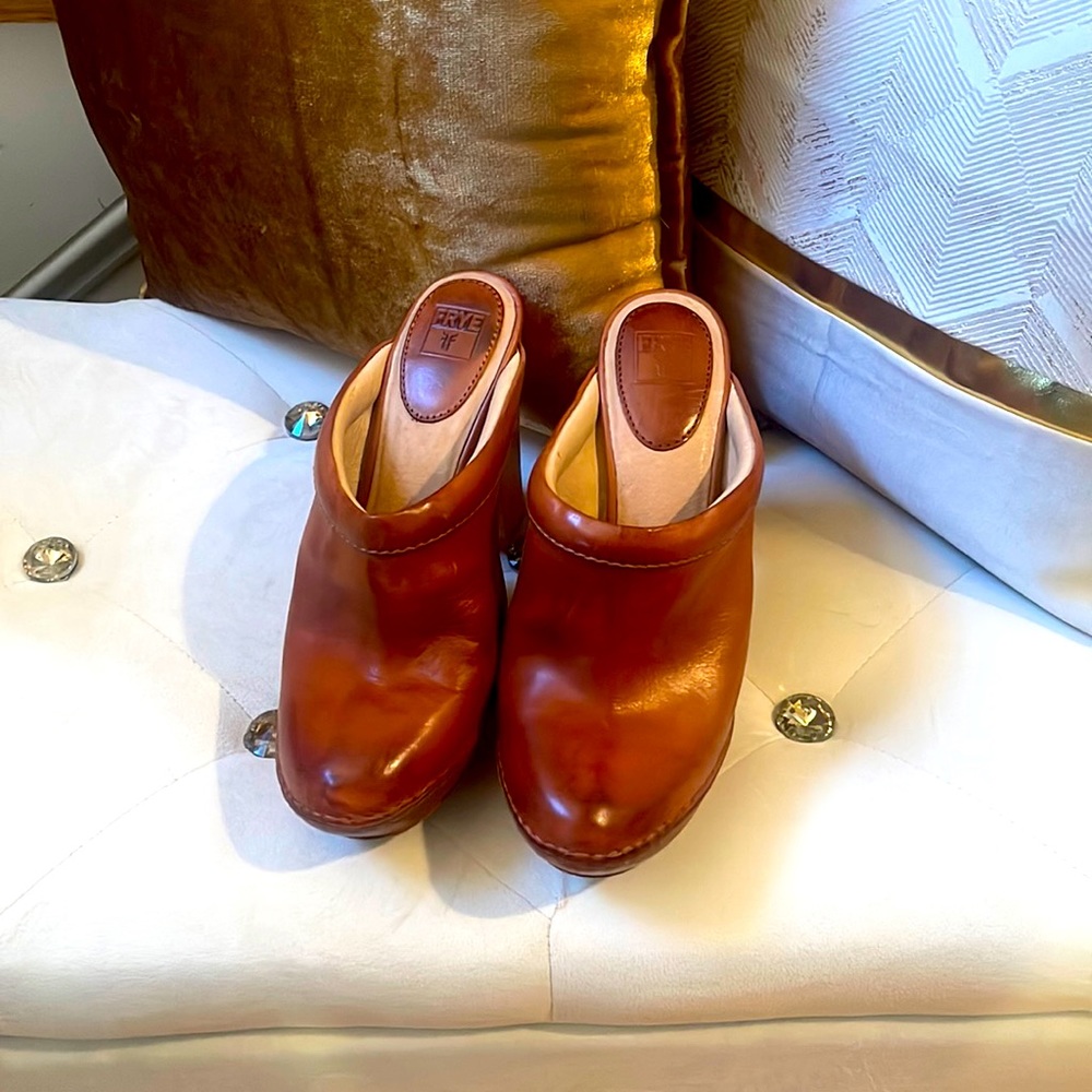 Practically new Frye clogs. Only worn once, Sz 9M. 5 inch heel & 1 inch sole.